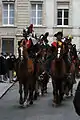 Cavalcade à la rue de l'Hôtel-de-ville.