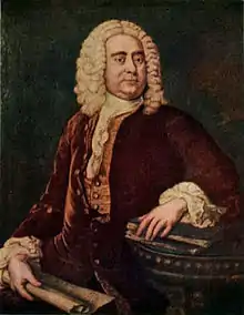 Portrait connu de Haendel, entre 40 et 50 ans, couleur, bras appuyé sur accoudoir de fauteuil, tourné vers la droite