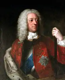 Portrait d'un homme en longue perruque et insignes royaux (décorations, manteau d'hermine).
