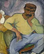 Homme assis (1910).