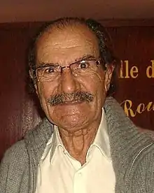 Gérard Hernandez interprète Raymond.