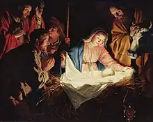 Tableau représentant des personnages regroupés autour de l'enfant Jésus et de sa mère Marie.