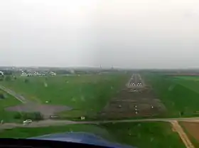 Finale sur la piste 30, avec aperçu de la cathédrale Notre-Dame et de la tour Perret.