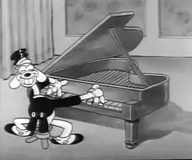 Goopy Geer jouant du piano dans le film Goopy Geer.