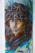 Portrait de femme par C215, à Londres.