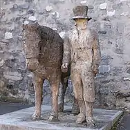 Statue du Gros-Bellet devant le château de Monthey.