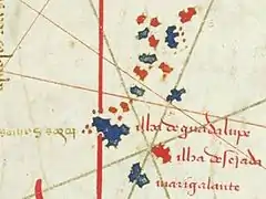 Les îles de Guadeloupe identifiées et nommées (Isla de Guadalupe, Isla Deserada, Marígalante et Todos Santos), planisphère de Cantino, 1502.