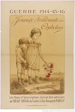 Une petite fille et un petit garçon qui jette des fleurs sur une tombe