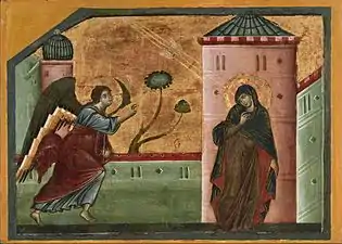 Peinture. L'ange arrive avec un mouvement brusque vers Marie, en retrait devant une petite tour.