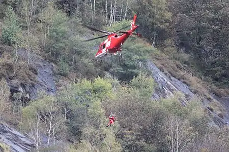 Treuillage d'un grimpeur à Tegna au Tessin en 2014.