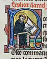 Lettre N, Saint Jérôme découpant un feuillet dans un morceau de parchemin, Vol.II, f.195ra.