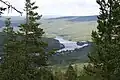 Le Glomma à Hanestad dans l'Østerdalen depuis la voie de chemin de fer Oslo-Røros, ici commune de Rendalen, comté de Hedmark