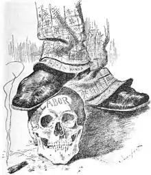 Political cartoon, showing the ankles and feet of a man; the suit trousers are labeled "Hanna" and are covered with dollar signs. One foot rests on a skull, marked "Labor". Resting on the ground near the skull is a burning cigar.