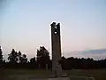 La cloche sur son monument.