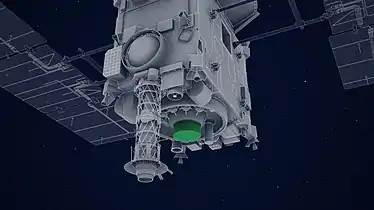 Schéma du tube de prélèvement d'échantillons et de l'impacteur (en vert) de la sonde Hayabusa 2.