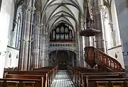 Vue intérieure de la nefvers la tribune d'orgue.