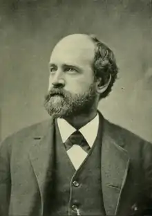 Portrait-photographie de Henry George en costume d'époque pourvu d'une continental tie