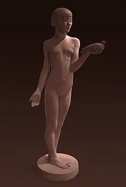 photo d'une sculpture : toute jeune fille nue aux cheveux courts, debout, un oiseau dans la main gauche