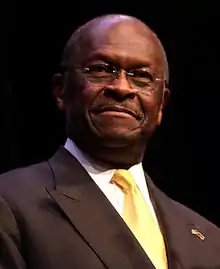 Herman Cain, homme d'affaires de Géorgie influent au sein du mouvement Tea Party (21 mai-3 décembre 2011).