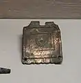 Plaque de ceinture en bronze émaillé, VIe siècle.