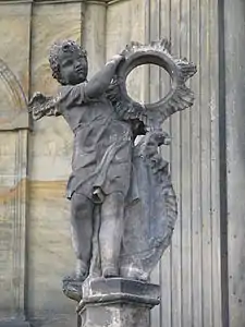 Un des douze Lucifers sur la colonne de la Sainte-Trinité à Olomouc (République tchèque).