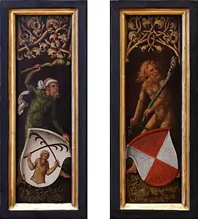 Miniature en couleurs : deux hommes nus et couverts de poils tiennent des massues. Un blason est posé devant chacun.