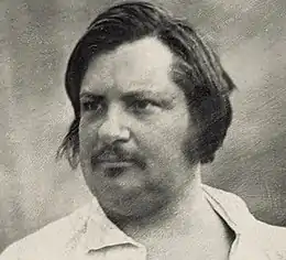 Daguerréotype en noir et blanc montrant le profil gauche d'un homme brun jouflu.
