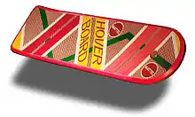 Photo d'un hoverboard (une planche sans roulettes, de couleur rouge et jaune).