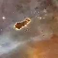 Ce globule de Bok a été surnommé la chenille (Par le télescope spatial Hubble).