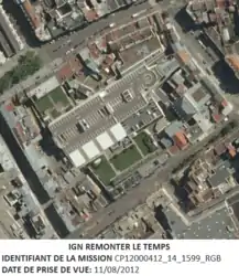 L'ilot des Tanneurs sur photo aérienne de 2012. Une grande partie de l’ilot est occupé par le centre commercial des Tanneurs avec un toit-parking