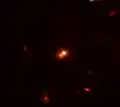 Petite partie des premières images de James-Webb (télescope spatial), dans cette petite partie de l'image se situe 3C 186.