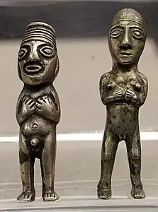 Homme et femme - Statuette en métal.