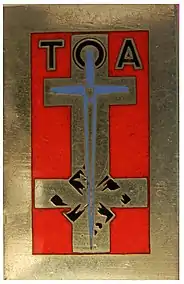 Insigne des troupes françaises d'occupation en Allemagne (1945-1949). L'épée française fracasse la croix gammée nazie.