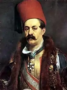 portrait d'homme moustachu portant un fez rouge