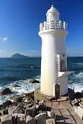 Photo couleur d'un phare maritime.