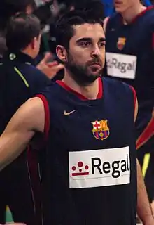 Portait de Juan Carlos Navarro avec le maillot de Barcelone, MVP du championnat d'Europe