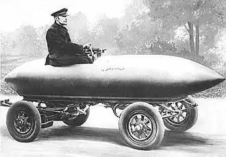 Record de vitesse par une automobile électrique, La Jamais contente 100 km/h pour 900 kg de batterie d'accumulateurs, 1899.