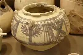 Vase en céramique peint de la période de Djemdet Nasr, provenant de Khafadje. Musée de l'Institut oriental de Chicago.