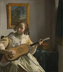 Joueuse de guitare, J. Vermeer, v. 1670