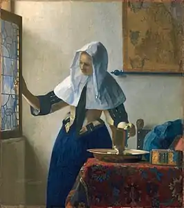Exemple de vie domestique : Johannes Vermeer, Jeune femme avec une carafe d'eau (vers 1662-1665, Metropolitan Museum of Art).