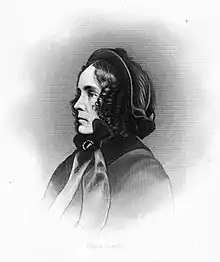 Gravure de profil d'une femme aux cheveux bouclés portant une coiffe