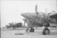 Des chasseurs Kawasaki Ki-45 japonais abandonnés capturés à l'aérodrome de Kallang.