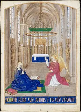 Peinture. L'ange parle à Marie assise sur un tapis, dans une nef d'église gothique.