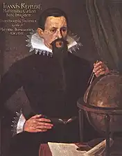 Portrait "de Strasbourg" complété (compas, globe).