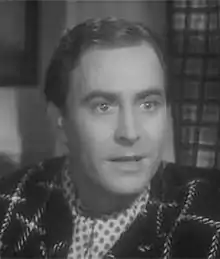 Description de l'image John Hubbard in Road Show (1941).jpg.