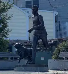 Statue de John J. Kelley avec son chien Brutus à Mystic dans le Connecticut.