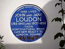 Circular plaque reading London County Council - Here lived John and Jane Loudon - 1783-1845 and 1807-1858 - Their horticultural work gave new beauty to London squares