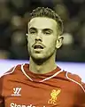 Jordan Henderson, premier capitaine à soulever la Premier League pour Liverpool.