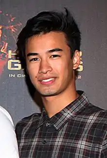 Jordan Rodrigues interprète Trey.