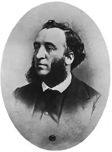 Portrait photographique de Jules Ferry en médaillon, le représentant de trois quarts face, barbu, un large front dégarni.